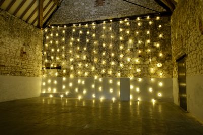 Festoon Light Backdrop at the Monks Barn