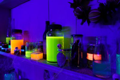 Fluorescent glowing potion shelf