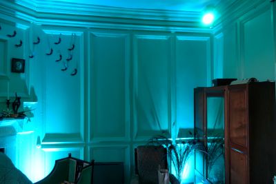 Aqua coloured lighting in the witch's sitting room