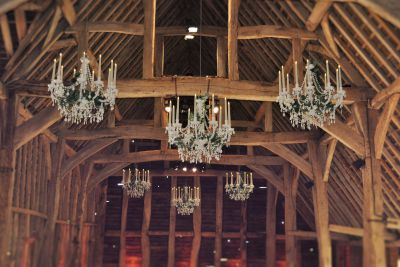White Chandeliers with LED Candles and Silk Ivy